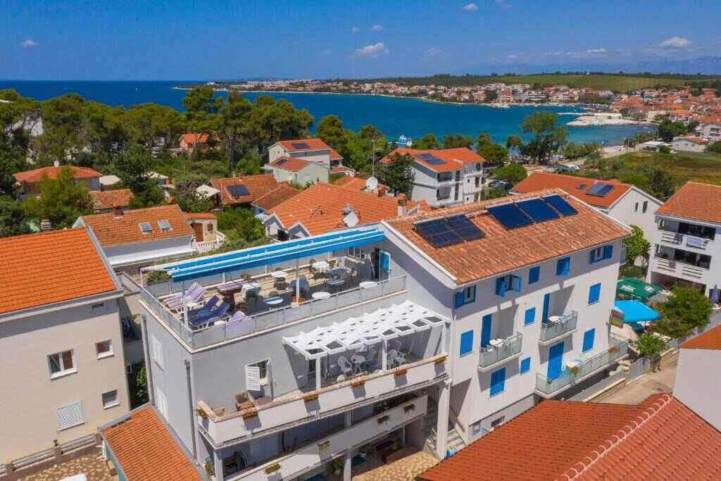 Pansion Pirat seen from above with the Adriatic sea in Petrčane